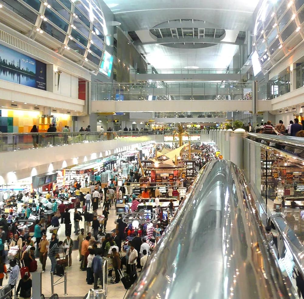 airport food court filled with people
